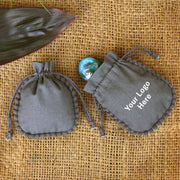 Small Gray Cotton Jewelry Pouches, Handmade Indian Storage Bags, Round PomPom Packaging Bags β CraftJaipur